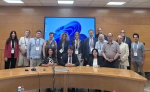 Group of people standing for a group photo after GA meeting