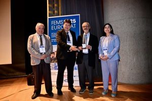 3 men's and 1 women on a prize ceremony
