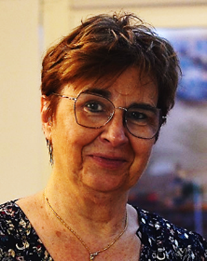 Lady with short hair and glasses